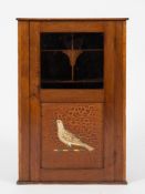 An early 20th century display cabinet crafted from a section of a rowing skull:,