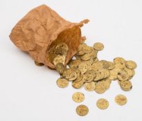 A collection of pressed gilt circular tags:,