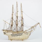 A 19th century bone and ivory prisoner-of-war style model of a 34 gun ship:,