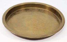 A circular brass serving tray from the Holland America Line liner SS Nieuw Amsterdam:,