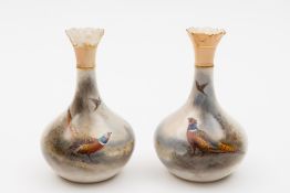 A pair of Royal Worcester porcelain vases by James Stinton: of tear drop form each enamelled with a