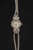 A lady's 9ct white gold and diamond set cocktail wristwatch:,