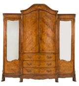 A 19th Century French kingwood, floral marquetry and gilt metal mounted armoire:,