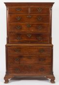 An early George III mahogany tallboy:, the upper part with a moulded cornice,