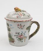 A Sceaux Penthièvre faience mug and cover: of mildly tapering form with rustic foliate handle,