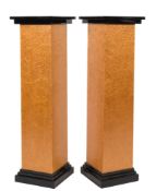 A pair of Art Deco birds eye maple and ebonised square pedestals:, with stepped tops and plinths,