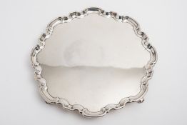 A George V silver salver, maker Harold Atkin, Sheffield, 1930: with moulded wavy edge border,