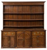 A late 18th/early 19th Century oak and crossbanded dresser:, of large size,