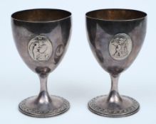 A pair of George III silver goblets, maker's marks illegible, London, 1791: crested,
