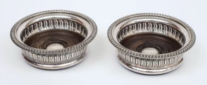 A pair of Elizabeth II silver wine coasters, maker Barker Ellis Silver Co, Birmingham,