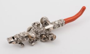 A 19th century silver and coral mounted rattle, maker JN ?: initialled AI,