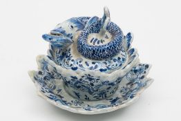 A Dutch Delft 'fish' bowl, cover and stand: of circular foliate moulded form,