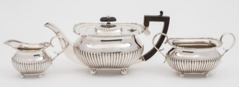 A George V silver three-piece tea service, maker William Hutton & Sons Ltd, Sheffield,