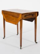 An early 19th Century mahogany and inlaid Pembroke table:, in the Sheraton taste,