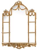 An Edwardian gilt gesso and cream decorated domed mirror:,
