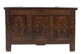 An 18th Century oak rectangular coffer:, with a plain hinged top,