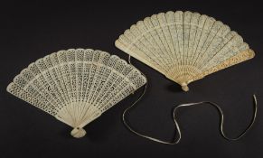 A 19th Chinese ivory brise fan: carved to both sides with figures in a garden landscape,