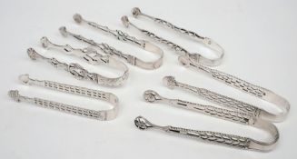 A pair of 19th century silver sugar tongs, maker W.L:  with pierced decoration 12cm.