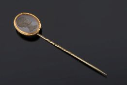 A hardstone intaglio cameo, portrait stick pin:, approximately 8cm total length.
