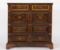 A 17th Century oak and walnut, laburnum and ebonised fronted rectangular chest:, in two parts,