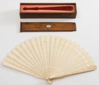 WITHDRAWN LOT 530 FS27
A late Regency period Chinese ivory brise fan: with central shield cartouche