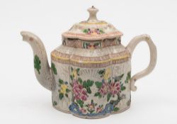 A Staffordshire polychrome salt glazed teapot and cover: of lobed form with serpent spout and