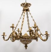 A porcelain and gilt metal eight branch chandelier: the foliate gilt metal corona with floral