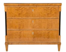 A Biedermeier maple veneer and ebonised rectangular chest:, the top with an ebonised moulded edge,