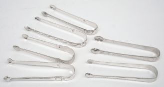A pair of 19th century silver sugar tongs, maker TC:  of plain form 13cm.