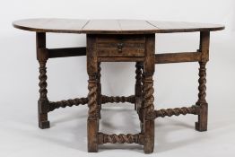 A late 17th Century oak oval gateleg table:,