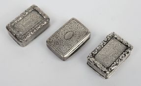 Three small late Georgian silver vinaigrettes,