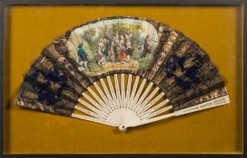 An early 19th century French fan: the paper leaf decorated with a rural wedding scene enclosed by a