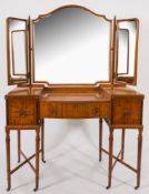 By Shapland and Petter, Barnstaple
A Raleigh Furniture satinwood and inlaid bedroom suite:,