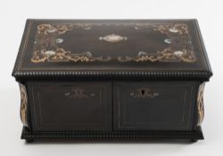 A 19th century ebony, mother of pearl and brass inlaid tea caddy: of rectangular outline,