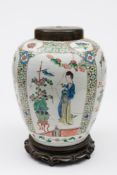 A Chinese famille verte jar: painted with shaped panels of court ladies on terraces and auspicious