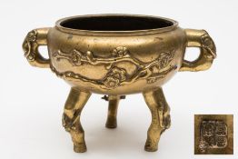 A Chinese bronze tripod censer: with all-over prunus decoration,