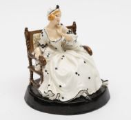 A Royal Doulton figure 'Proposal Lady', HN716: seated on a chair,