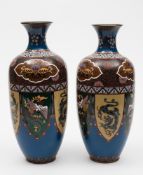 A pair of Japanese cloisonne vases: of ovoid form with powder blue waisted necks,