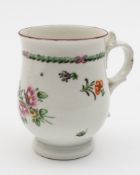A Richard Champion (Bristol) porcelain mug: of bell shaped form with double scroll handle and thumb