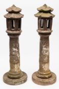 A pair of Chinese style stoneware garden lamps: of pagoda outline,