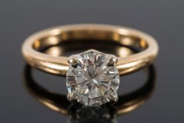 A diamond single-stone ring: with circular brilliant-cut diamond approximately 6.7mm x 3.