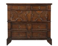 A Jacobean oak rectangular chest:, in two parts,