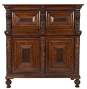 An early 18th Century Flemish carved rosewood court cupboard:, in two sections,