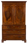 A George III mahogany and inlaid adapted linen press:,