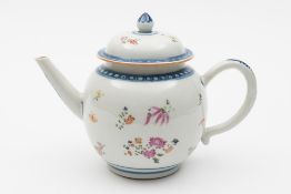 A Chinese porcelain teapot and cover: of cannonball form painted in underglaze blue and enamelled
