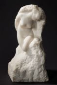 Francois Emile Popineau, a carved marble study of a female nude: signed Popineau, 36.5cm. high.