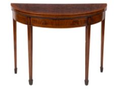 A George III mahogany and inlaid half round card table:, crossbanded in rosewood,