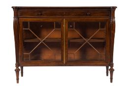 An early 19th Century rosewood and inlaid low bookcase:, bordered with boxwood lines,