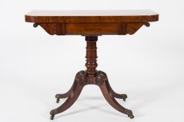 A Regency mahogany rectangular card table:, the baize lined hinged top with rounded corners,