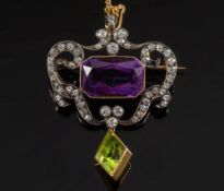 An Edwardian amethyst, diamond and peridot pendant/brooch:, the central,